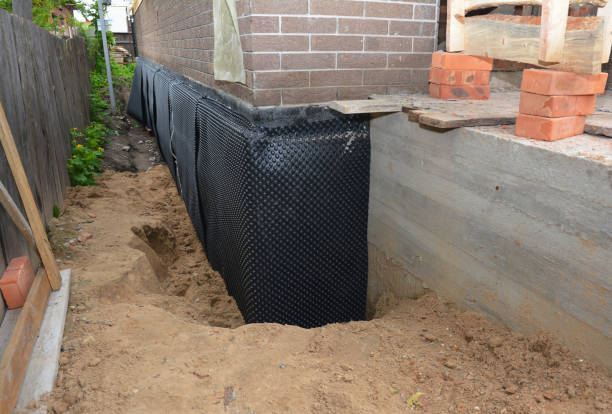 SJ Waterproofing Pros technician performing targeted Sump Pump Installation assessment in Alpha, NJ